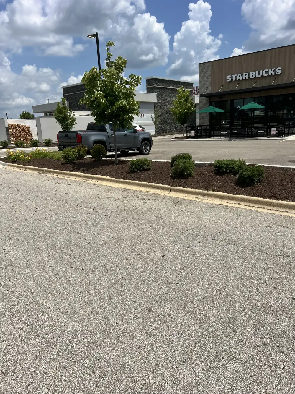 Commercial property turf care at a retail location in Illinois
